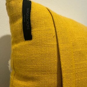 Statement accent pillow with a lot of detail and texture.